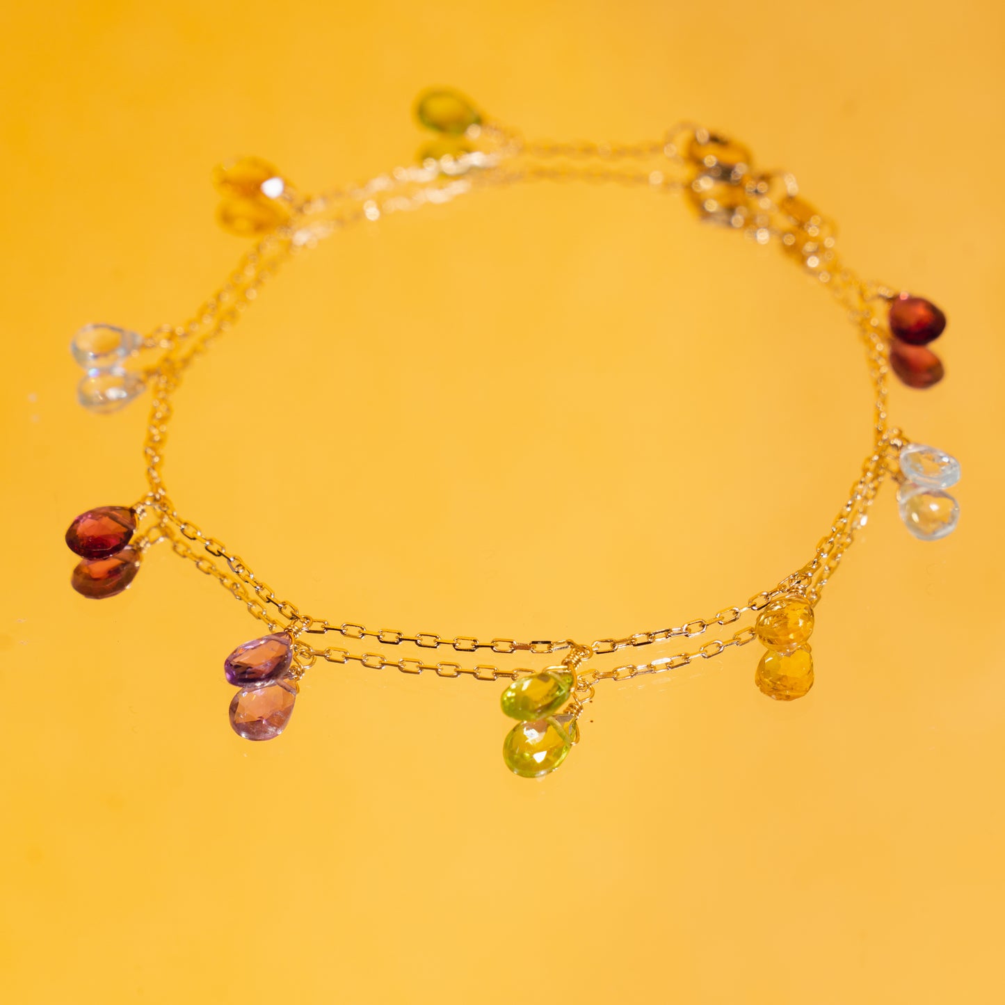 14k Garnet, Blue Topaz, Citrine, Peridot, and Amethyst Bracelet 7.5"