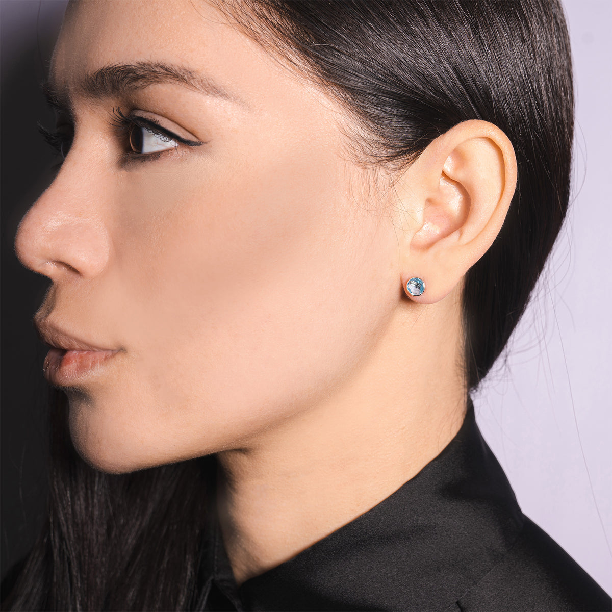 14k White Gold Blue Topaz Round Bezel Stud Earring