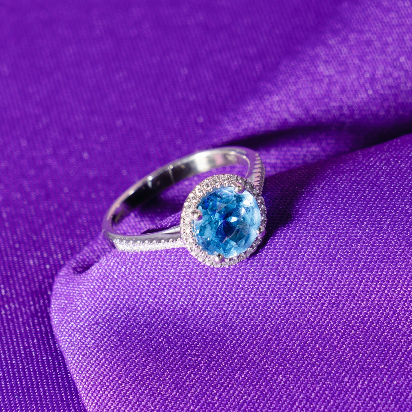 14k White Gold Swiss Blue Topaz Round VS Diamond 0.16ct Ring