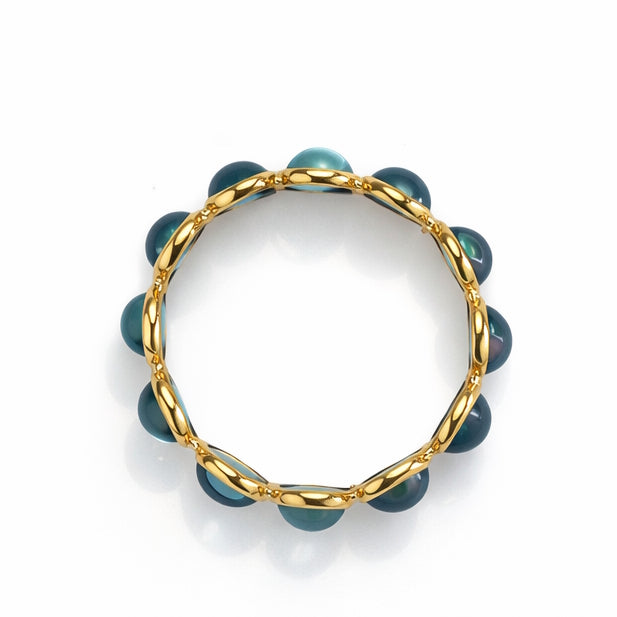 18k Blue Topaz Round Bezel Eternity Ring